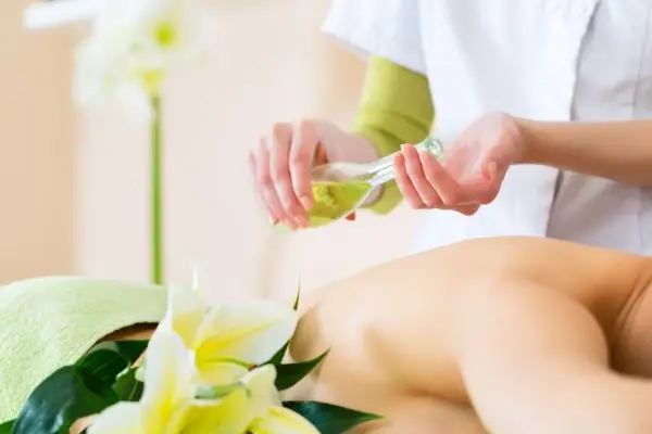 CBD massage oil used to relieve clients’ pains and stress.